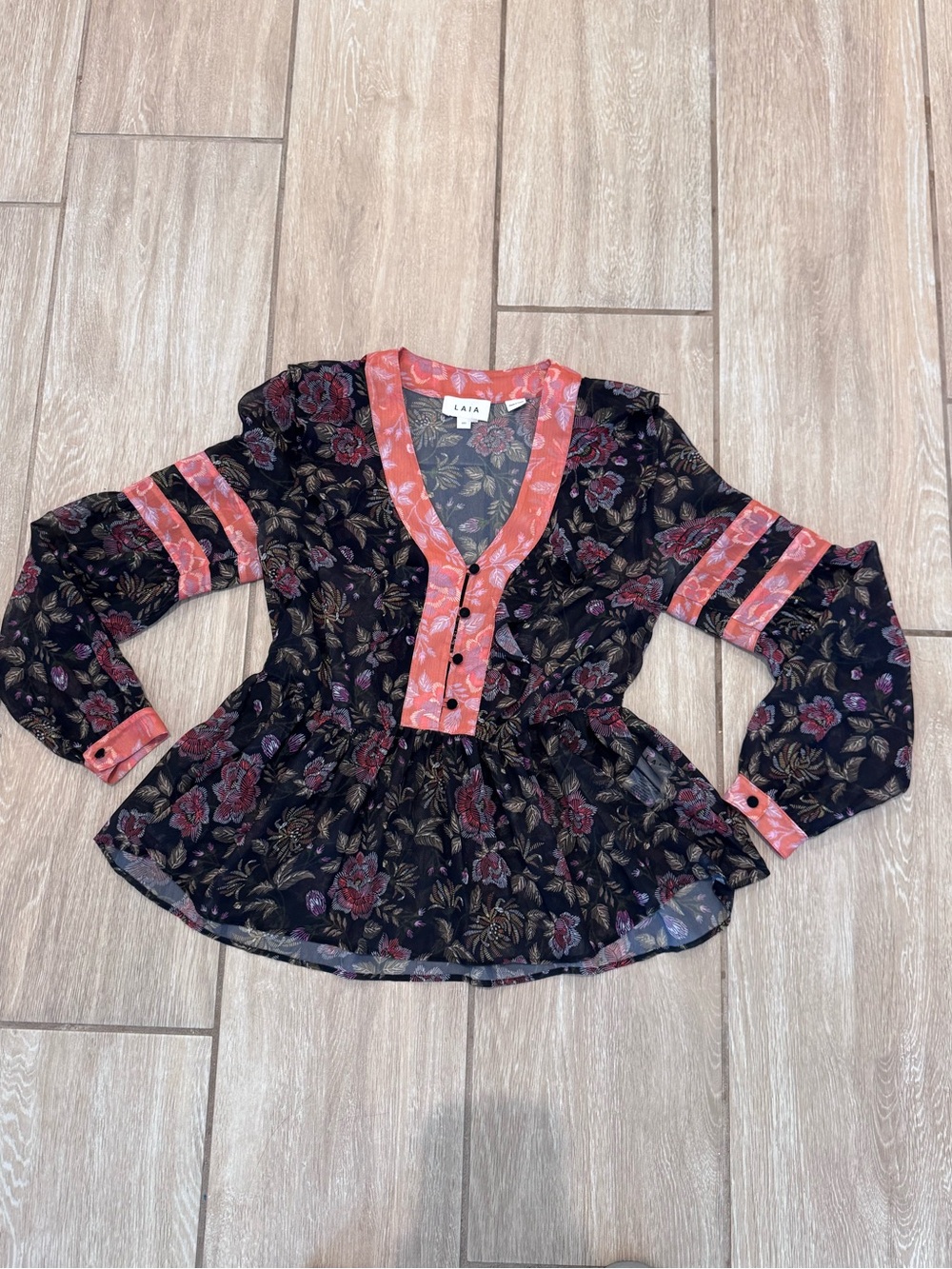 Laia Women’s Black Floral Peplum Blouse with Coral Trim